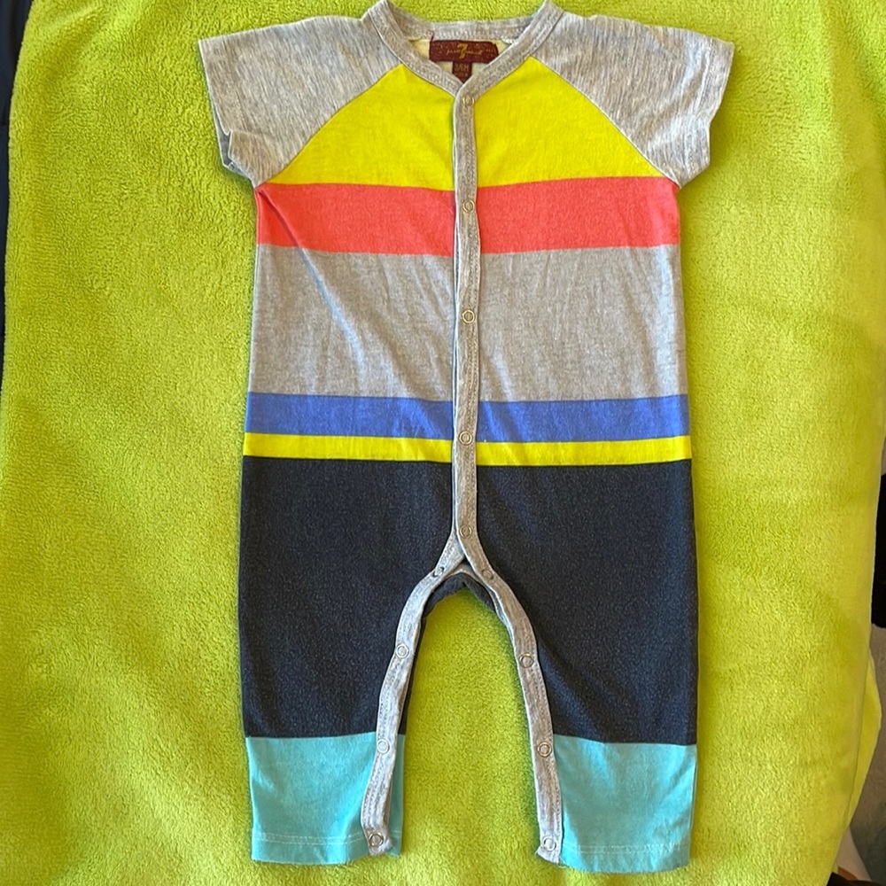 Multi-colored short sleeve onesie, seven jeans, size 3-6 months.